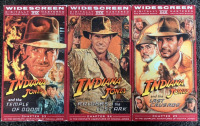 DVDS AND VHS TAPES INCLUDING ROCKY VHS COMPLETE SET, INDIANA JONS CHAPTERS 23, 24, AND 25, WEDDING CRASHERS, LIFE, WILL PENNY, OUTLAW JUSTICE, GRACE UNDER FIRE AND MORE - 3