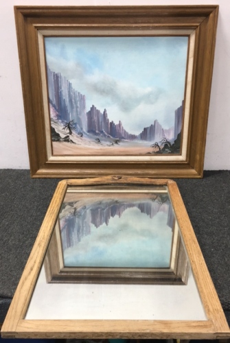 A Canyon Desert Painting And A Mirror