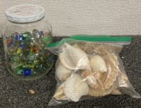 (2) WINE GLASSES, METAL BUCKET, WHITE CANDLE, BAG OF SEASHELLS, (4) BLUE AND WHITE SPECKLE CAMPING MUGS, JAR OF MARBLES - 5