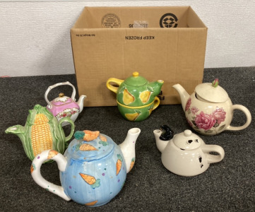 BOX INCLUDING COLLECTABLE TEA POTS