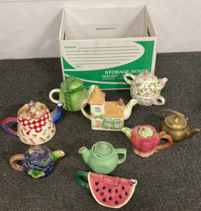 BOX INCLUDING COLLECTABLE TEA POTS