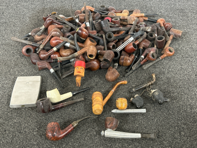 LARGE COLLECTION OF TOBACCO PIPES IN VARIOUS DESIGNS AND MATERIAL