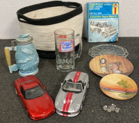 AVON FISHING STEIN, BUDWEISER BEER MUG, RED CORVETTE MODEL CAR, 1999 SHELBY SERIES 1 CAR, (2) DECORATIVE CARS, (1) CRYSTAL FRUIT PLATE AND MORE