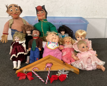 BIN INCLUDING VINTAGE PORCELAIN DOLLS, MAMMY AND PAPPY YOKUM DOLLS, (1) CABBAGE PATCH DOLL, CHRISTMAS DECORATIONS AND MORE