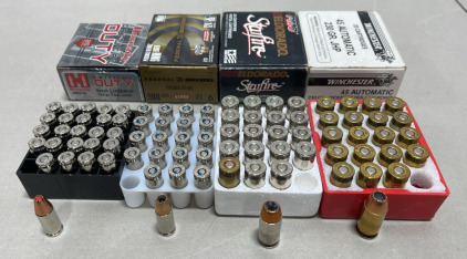 (1) Box Of 25 Hornsby 9mm 124gr. Pistol Cartridges, (1) Box Of Federal 9mm 124gr. Pistol Cartridges, (1) Box Of 20 PMC 45 Auto 230gr. Pistol Cartridges, (1) Box Winchester 45 Automatic 230gr. Pistol Cartridges