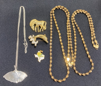 Silver Tone Gingko Leaf Necklace, (2) Gold Tone Chain Necklaces, (2) Gold Tone Animal Pins, (1) Texas Pendant
