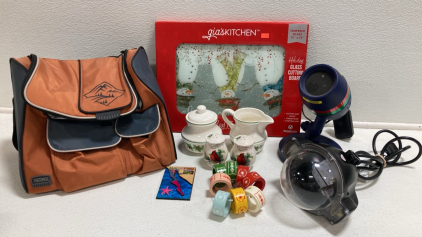 Thermos Travel Cooler Bag, Holiday Glass Cutting Board, (2) Light Projectors, Wood Napkin Rings, Holly Sugar and Creamer Set, Cardinal Salt and Pepper Shakers, Fridge Magnet