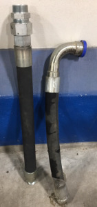 (1) 40&rsquo;&rsquo; x 2&rsquo;&rsquo; Hydraulic Hose, (1) 36&rsquo;&rsquo; x 1 3/4&rsquo;&rsquo; 90 Degree Hydraulic Hose