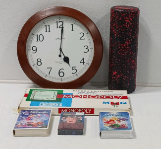 (1) Wall Clock (1) Monopoly Board Game (3) VHS Movies