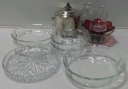 (5) Baking Dishes (1) Glass Platter (4) Glass Candy Dishes (2) Glass Decanters (1) Steel Pot