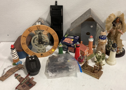 (1) Exposed Gear Clock (1) Native American Decoration (6) Light House Decorations And More!