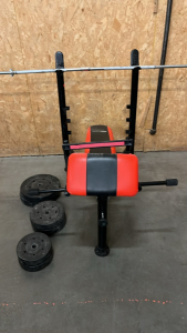 RED WEIGHT BENCH W/ RACK AND WEIGHTS