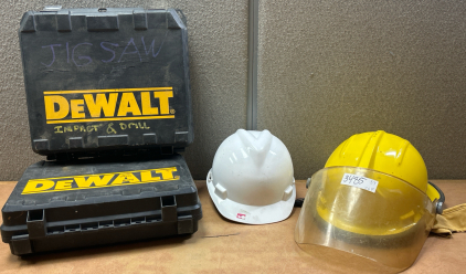 2 SAFETY HATS-1 IS INSULATED AND 2 EMPTY SEEALT TOOL CASES