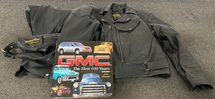 UNIK ULTRA LEATHER CHAPS (SIZE SMALL), LEATHER JACKET (SIZE 42) AND GMC "THE FIRST 100 YEARS" BOOK