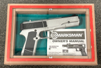 MARKSMAN BB REPEATER AIR PISTOL IN SHADOWBOX. UNKNOWN WORKING CONDITION.