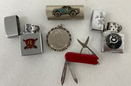 (2) COLLECTIBLE LIGHTERS, COIN PENDANT, LIGHTER COVER AND MULTI-TOOL