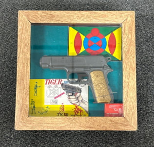 TIGER- COLT .45 AUTOMATIC PELLET GUN IN SHADOW BOX. UNKNOWN WORKING CONDITION.