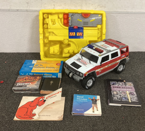 (1) CHILDRENS TONKA FIRE DEPARTMENT TRUCK TOY, WITH (1) “CLIFFORDS TRICKS” BOOK, (1) “THE NATURAL VISION IMPROVEMENT KIT” AND MORE