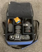 (1) CANON T50 PROGRAMMED AUTOMATION AUTOMATIC FILM TRANSPORT CAMERA WITH (1) CAMERA BAG, (1) CANON SPEEDLITE 244T ATTACHMENT, (2) LENSE ATTACHMENTS, AND MORE