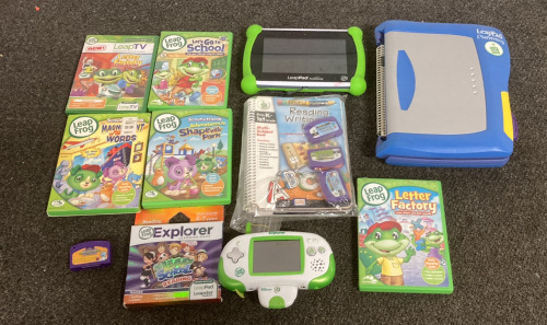 (1) LEAP PAD LEARNING SYSTEM PLUS WRITING, (1) LEAP PAD ACADEMY TABLET, (5) LEAP FROG LEARNING CDS, AND MORE