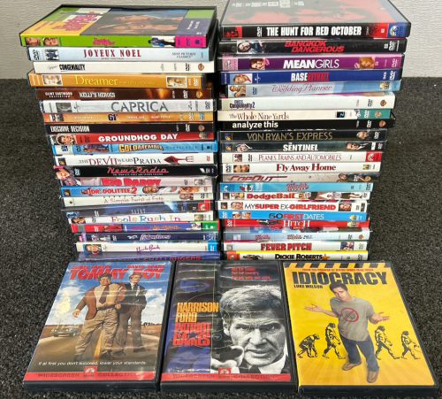 30+ DVD MOVIES INCLUDING TOMMY BOY, PATRIOT GAMES, IDIOCRACY AND MANY MORE