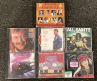 BOX OF CDS INCLUDING QUEEN, SHANIA TWAIN, THE CLASH, JOHN DENVER, TIM MCGRAW, YOUNG GUNS, GUNS N’ ROSES AND MORE - 2