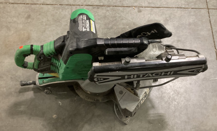 (1) HITACHI 12&rdquo; SLIDE COMPOUND MITER SAW (POWERS ON)