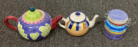 (2) CERMAIC TEA POTS WITH (5) CERAMIC MUGS AND (1) CERAMIC DISH - 2