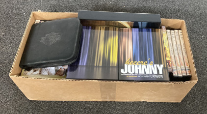 (1) 20.5&rdquo;X9.5&rdquo; BOX OF DVDS, AND DVD SETS INCLUDING &ldquo;CELEBRATING FIVE DECADES OF BONO&rdquo;, &ldquo;THE ADVENTURES OF SHERLOCK HOLMES&rdquo; AND MORE