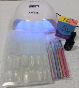 (1) Jewhiteny Super UV LED Lamp (2) Cases of Nail Tips. (1) 6pk Nail Brushes (1) Beetles Nail Art Foil Glue Gel