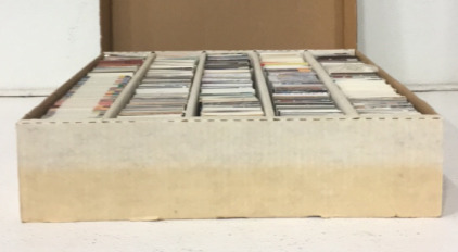 (1) Box Of (3500+) NFL, MLB, And NBA Cards Including Players Such As Pete Holohan, Tim Harris, Pete Mandley, Steve Wisniewski, Harry Hamilton, Keith Woodside, Blue Edwards, Khalid Reeves And More