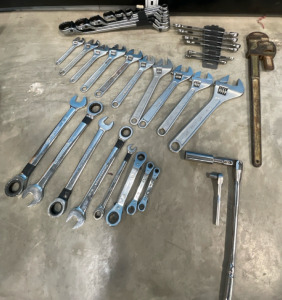 (20) Different Sized Wrenches, (10) Different Sized Adjustable Wrenches, (2) Socket Wreches, & 24” Pipe Wrench