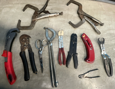 An Assortment Of Pliers, Wired Strippers , Scrissors, & Vise Grips Clamps