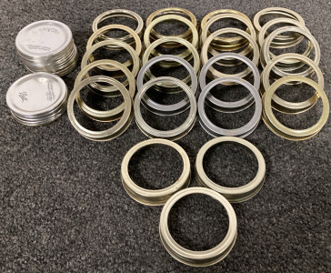 CANNING JAR LIDS (34) AND RINGS (23)