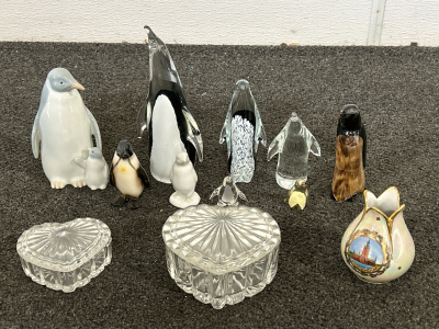 PENGUIN FIGURINES, GLASS HEART DISHES AND IRIDESCENT STOCKHOLM SOUVENIR
