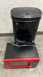 AUTOMATIC BLACK TRASH CAN (WORKS) AND RED MICROWAVE ( WORKS)