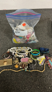 BAG OF COSTUME JEWELRY, HAIR PIECES, POCKET MIRRORS AND MORE