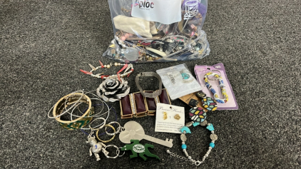 BAG OF JEWELRY EARRINGS, NECKLACES, KEYCHAINS, ANF MORE