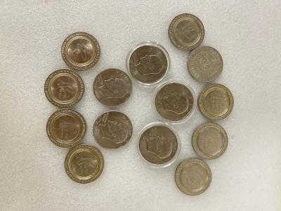 (9) LAS VEGAS TOKENS AND (5) IKE DOLLARS