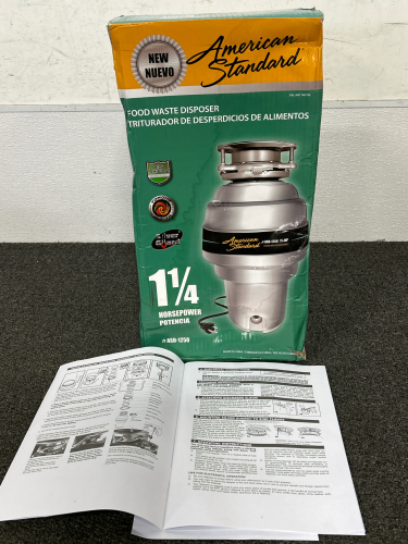 AMERICAN STANDARD FOOD WASTE DISPOSER WITH 1-1/4 HP, INSTRUCTION MANUAL-BOX IS BEAT UP BUT PRODUCT LOOKS TO BE NEW