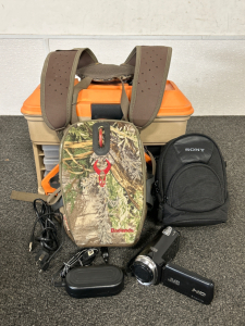 BADLANDS PACK, JVC CAMCORDER AND SONY BAG WITH CHARGER, AND FLAMBEAU TACKLE BOX