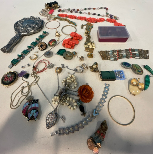 An Assortment Of Jewelry Including Pearls, Necklaces, & Silver Hand Mirror