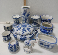 (1) 10" Blue & White Porcelain Cylinder Vase (2) 5.5" Candle Holders (1) Bowl w/ Lid (4) Assorted Planters & More!