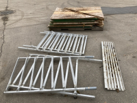 PALLET OF CHIP BOARDS AND ALUMINUM RACKS