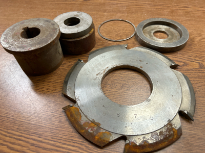 BOX WITH NUMEROUS 3&rdquo; DIAMETER ARBOR CUTTERS AND BUSHINGS-STYLES/TEETH/THICKNESS MAY VARY