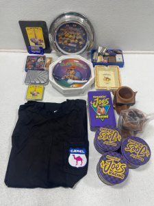 Assorted Joe Camel Accessories Including (2) Ashtrays, (2) Cigarette Holders, XL T-Shirt, Lighters and More………