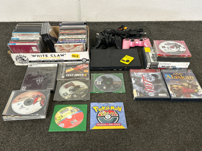 PLAY STATION 2 (POWERS ON) WITH GAMES, CONTROLLERS, MEMORY CARDS, CORDS, PLUS PS 1 GAMES, COMPUTER GAMES AND MUSIC CD&rsquo;S