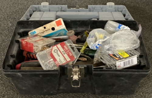 BLACK AND GREY TOOLBOX INCLUDING SCREWDRIVERS, HOOKS AND EYES, TOGGLE BOLTS, KNIFE FILES AND MORE