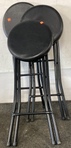 THREE BLACK FOLD OUT STOOLS