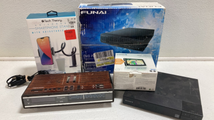 DVD Player, Garmin GPS, Phone Stand, Radio Alarm Clock, Sony DVD Player